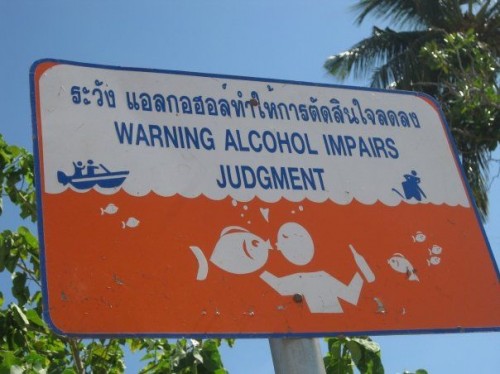 warning - alcohol impairs judgment - fish kisser