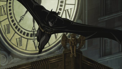 batman jumps past gargoyle