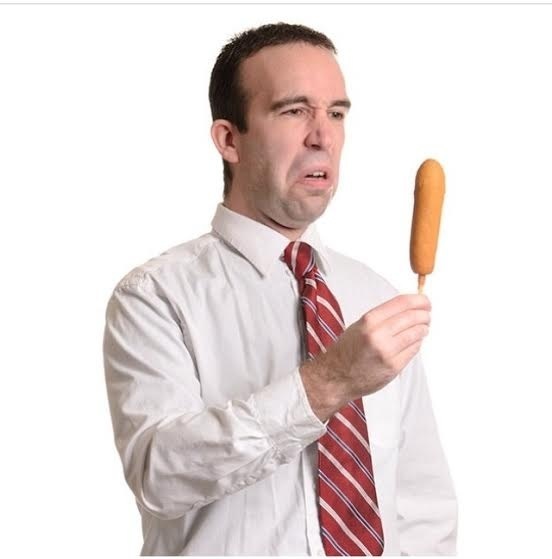 disgusted by a corn dog.jpg