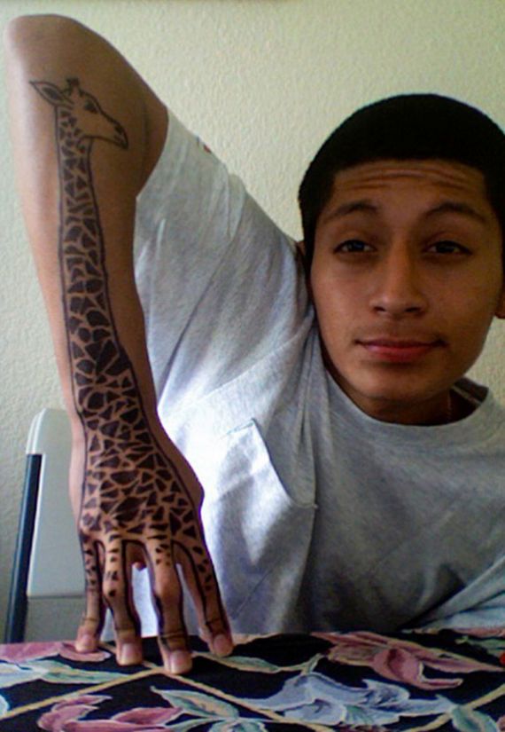 giraffe hand and arm tattoo.jpg