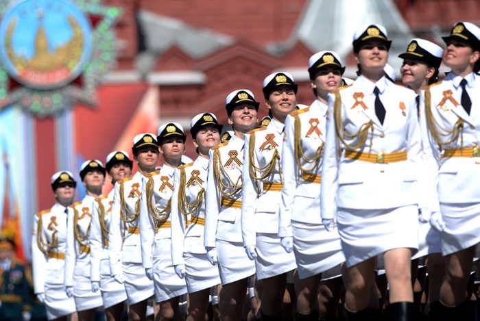 white uniformed women.jpg