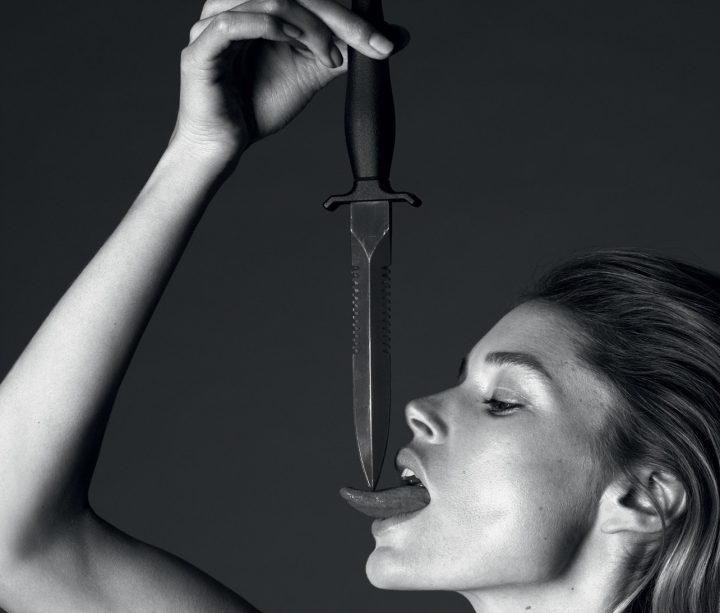 Doutzen Kroes licking a knife.jpg