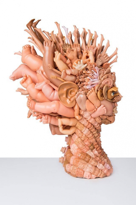 http://dangerousminds.net/comments/disturbingly_beautiful_sculptures_created_with_discarded_doll_parts