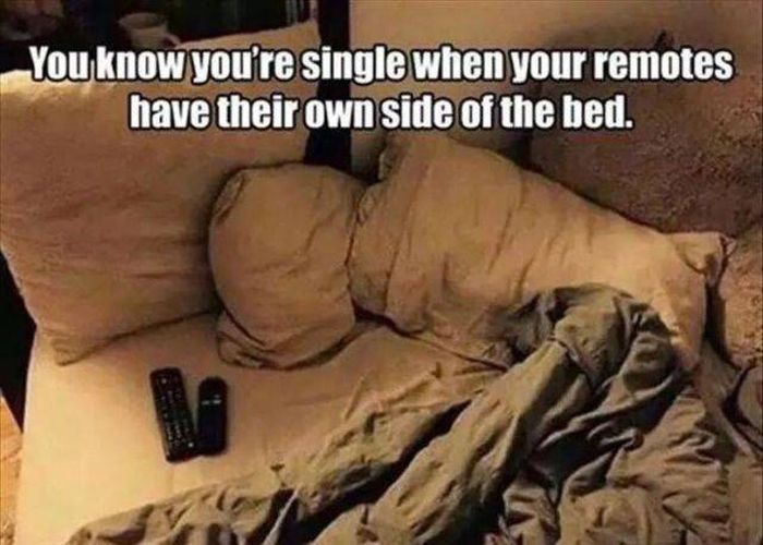 remotes in bed.jpg