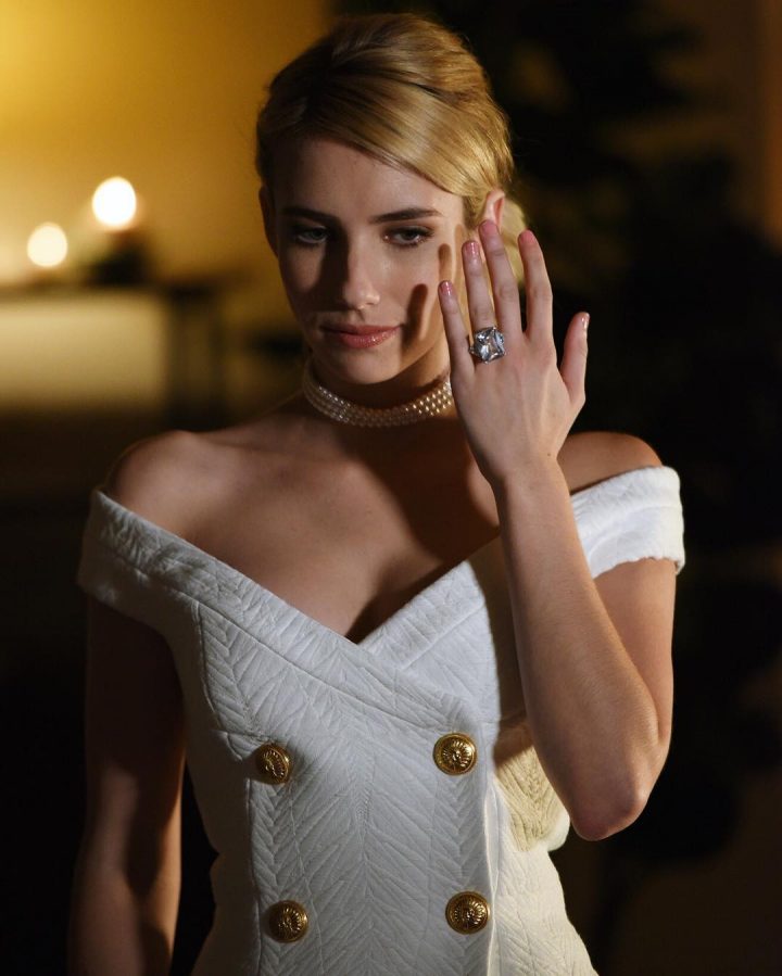 Emma Roberts with a large rock.jpg